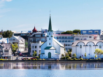 Reykjavic, Iceland city scape - lake quay in city center.